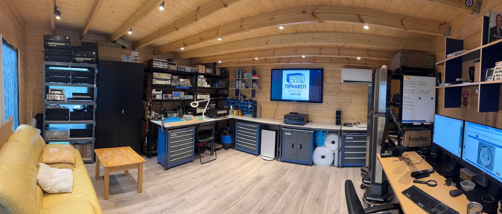 Topman511 Repairs workshop, shelves of vintage hi-fi equipment and a test bench